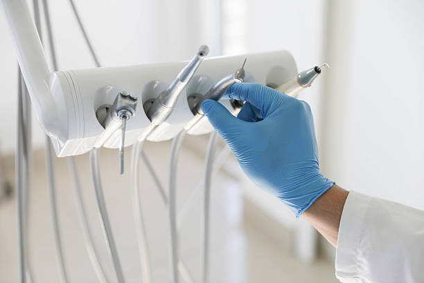 Professional Tooth Extraction technician working in Cape May, NJ